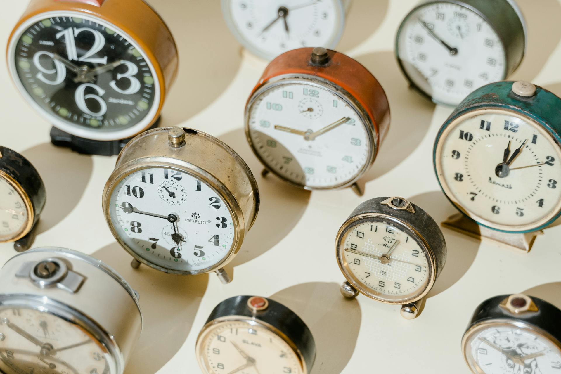 Collection of vintage clocks symbolizing time tracking and the importance of measuring average session duration in analytics