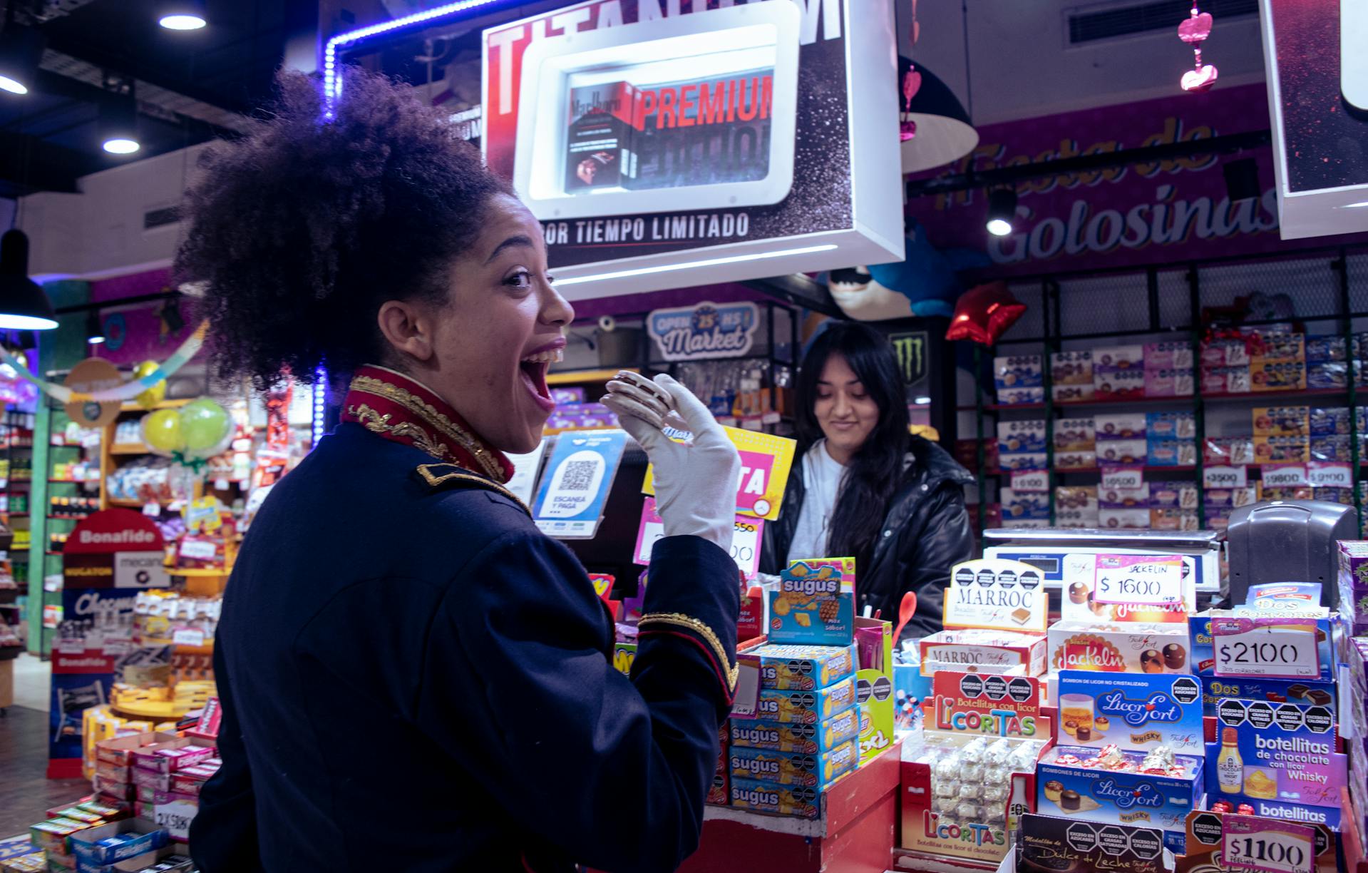 Excited customer in a candy store showcasing a personalized in-store experience with tailored product displays and local promotions—illustrating the offline equivalent of ecommerce personalization.
