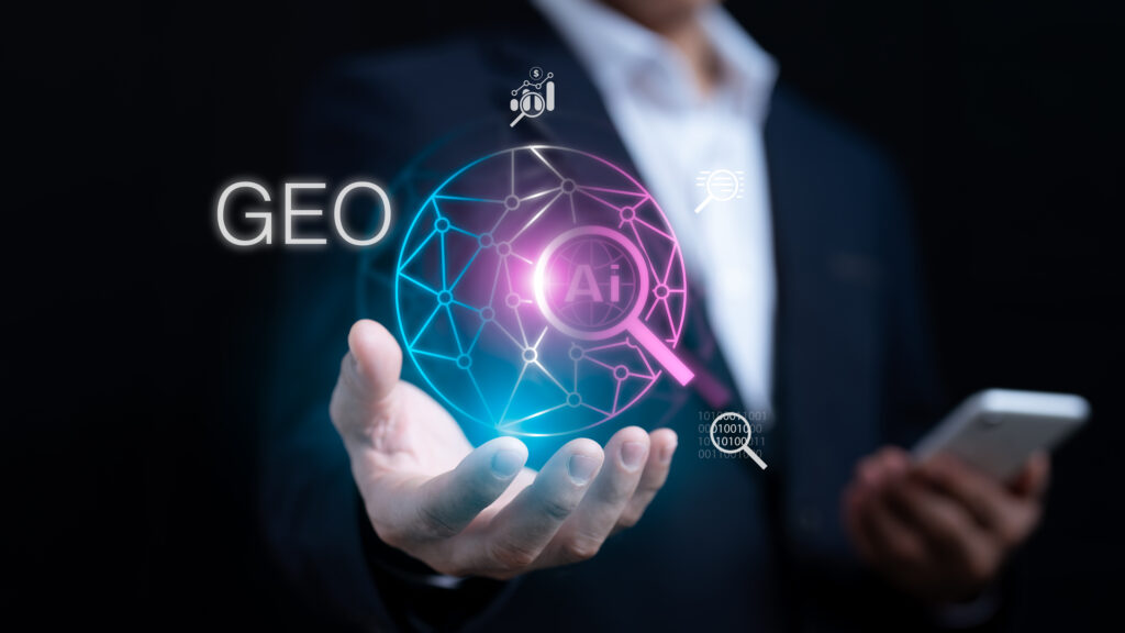 Businessman holding digital AI interface with the word GEO — representing generative engine optimization and its role in enhancing brand visibility in AI-generated answers.