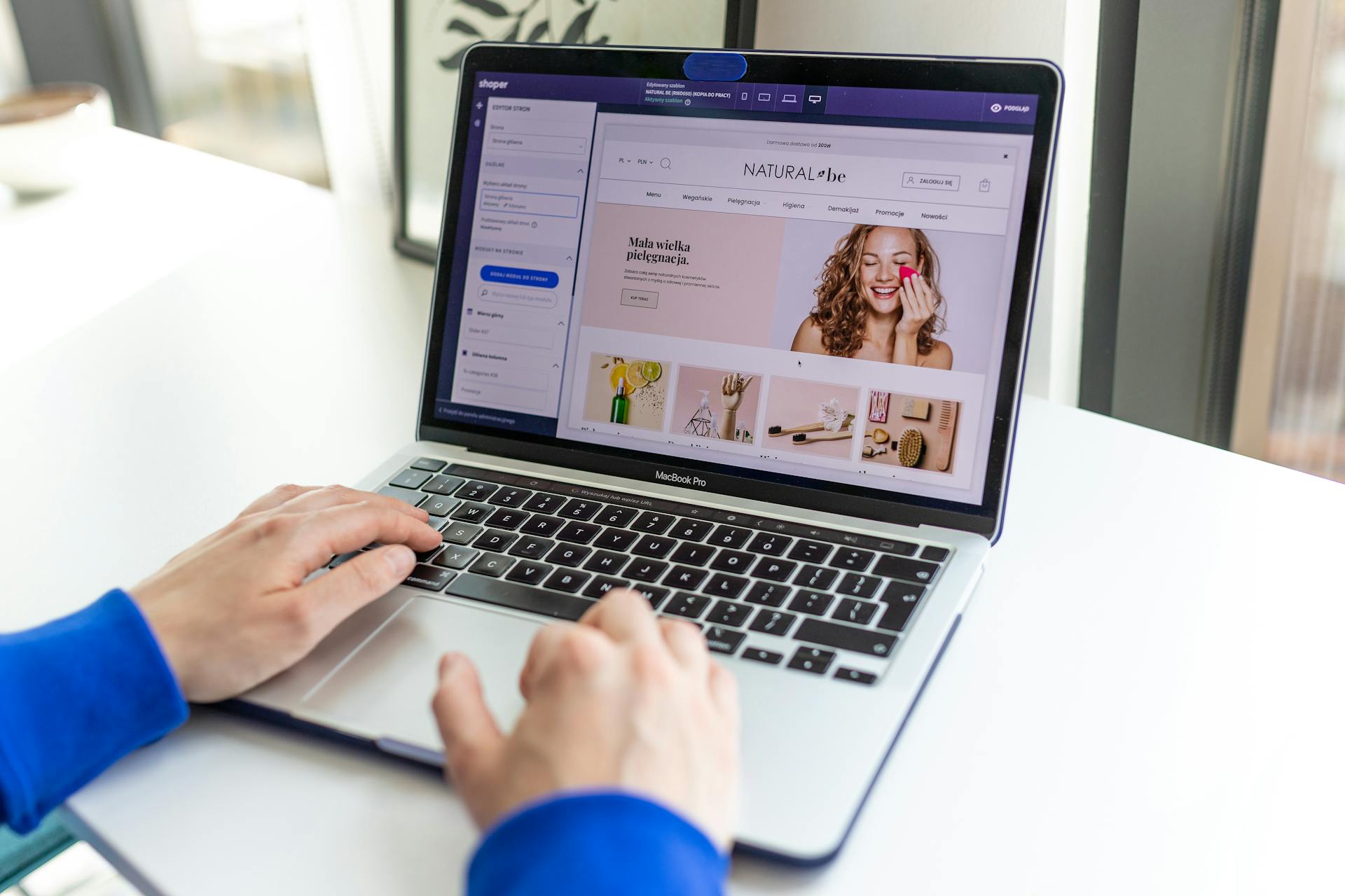 User optimizing an ecommerce store homepage layout on a laptop, illustrating real-time design changes for improved Ecommerce Conversion Optimization and enhanced customer experience.