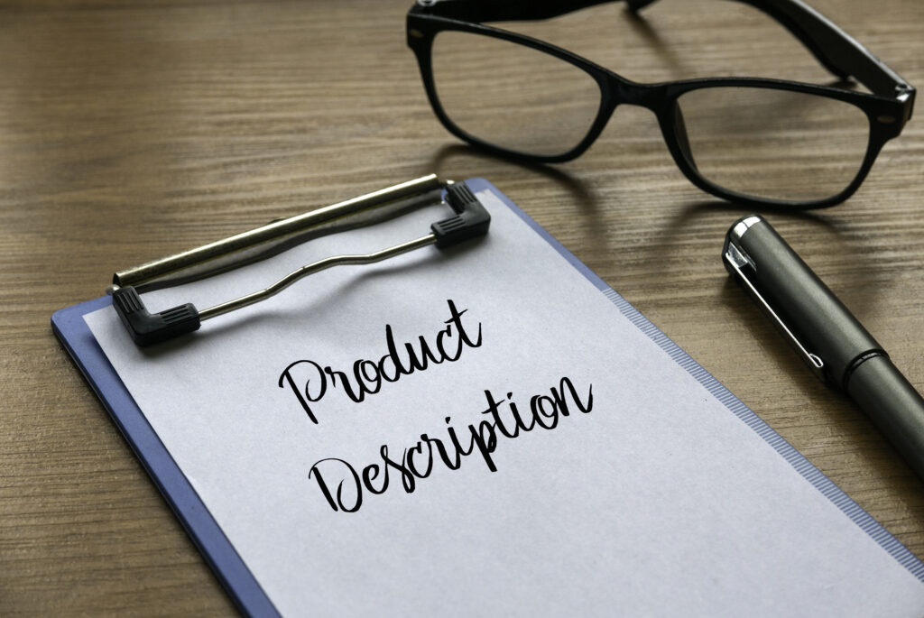 Clipboard with “Product Description” text on a desk, representing how product detail pages (PDPs) influence AI shopping and product discovery.