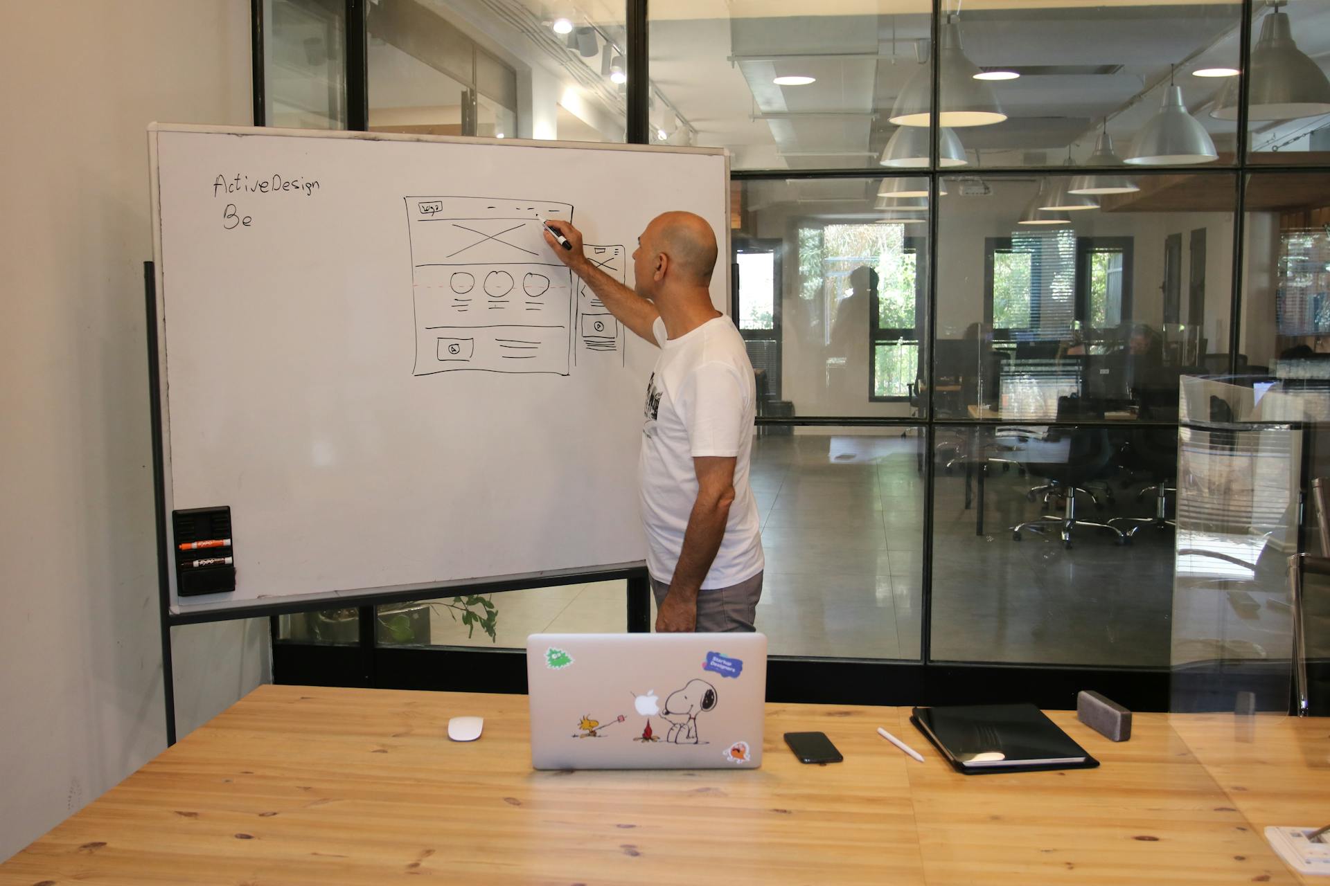  UX designer sketching interface improvements to enhance core web vitals and user experience