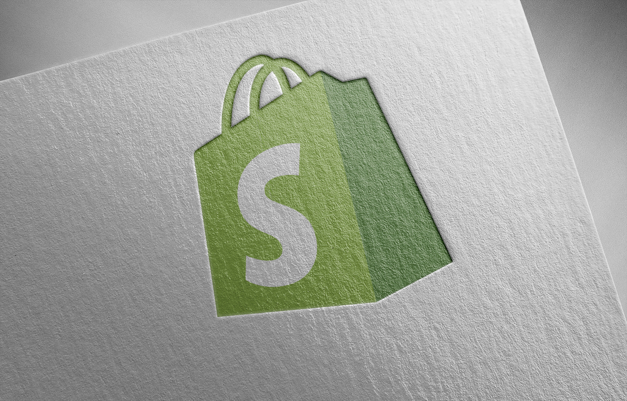 Shopify ecommerce logo illustrating average PageSpeed score issues and the need for Shopify speed and performance optimization.