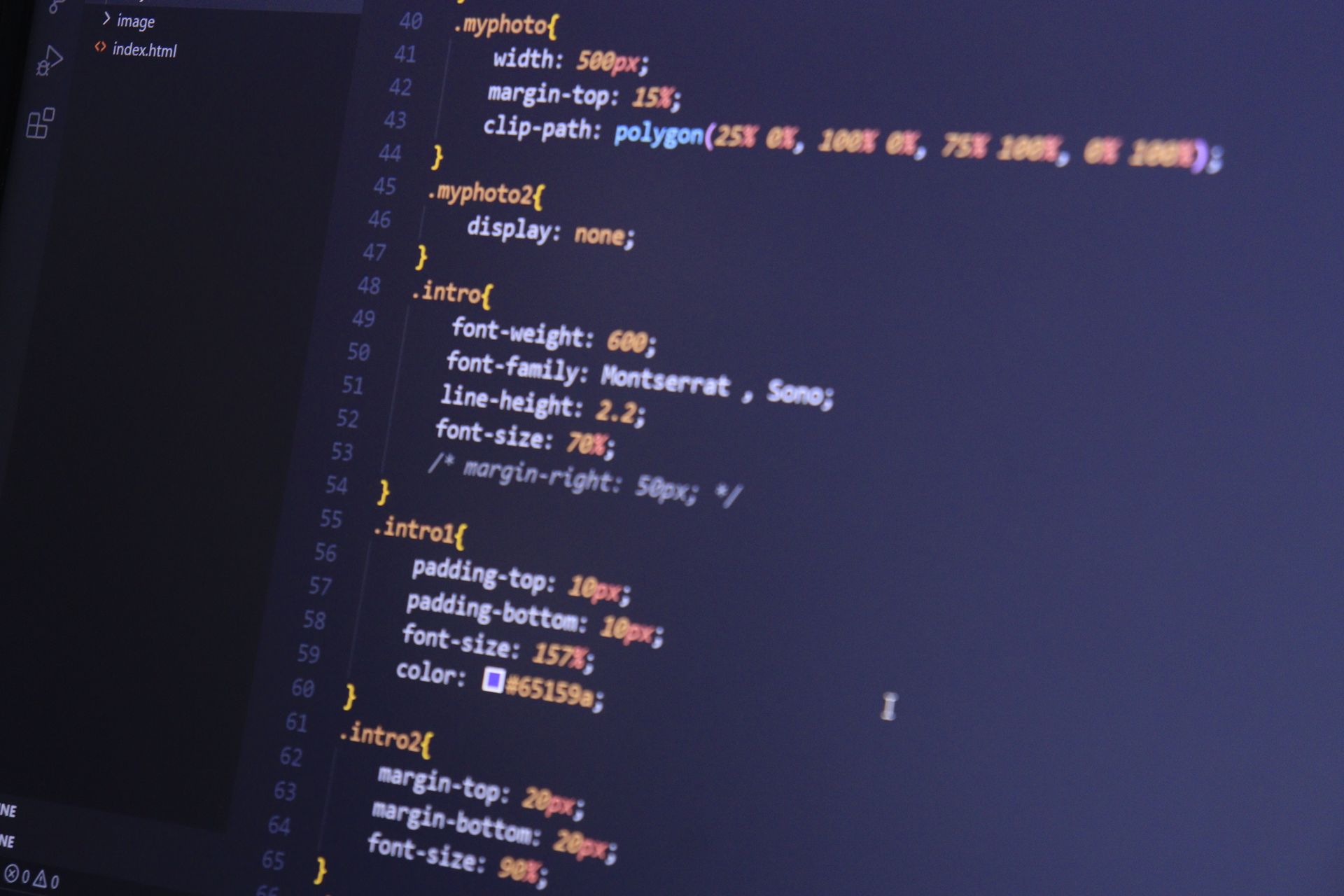 CSS code displayed in a code editor, representing CSS optimization techniques such as critical CSS, inline critical CSS, minify CSS, and removing unused CSS to reduce render-blocking resources and improve Shopify page speed.