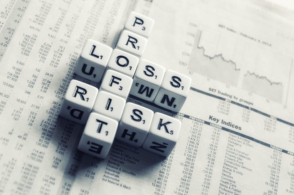 Slow Shopify store causing revenue loss illustrated with risk blocks on financial charts