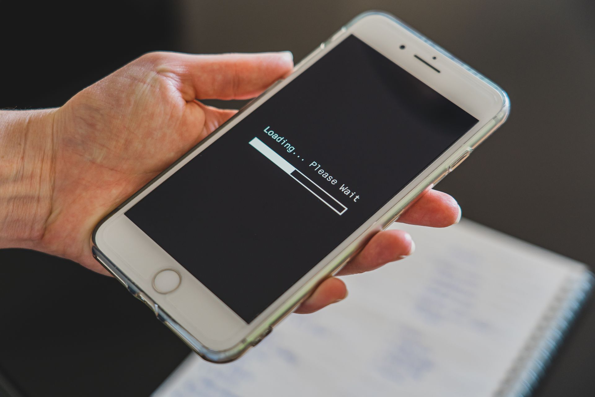 Slow page load speed on a mobile device causing a loading delay, illustrating how poor performance impacts mobile traffic, bounce rate, and conversions.
