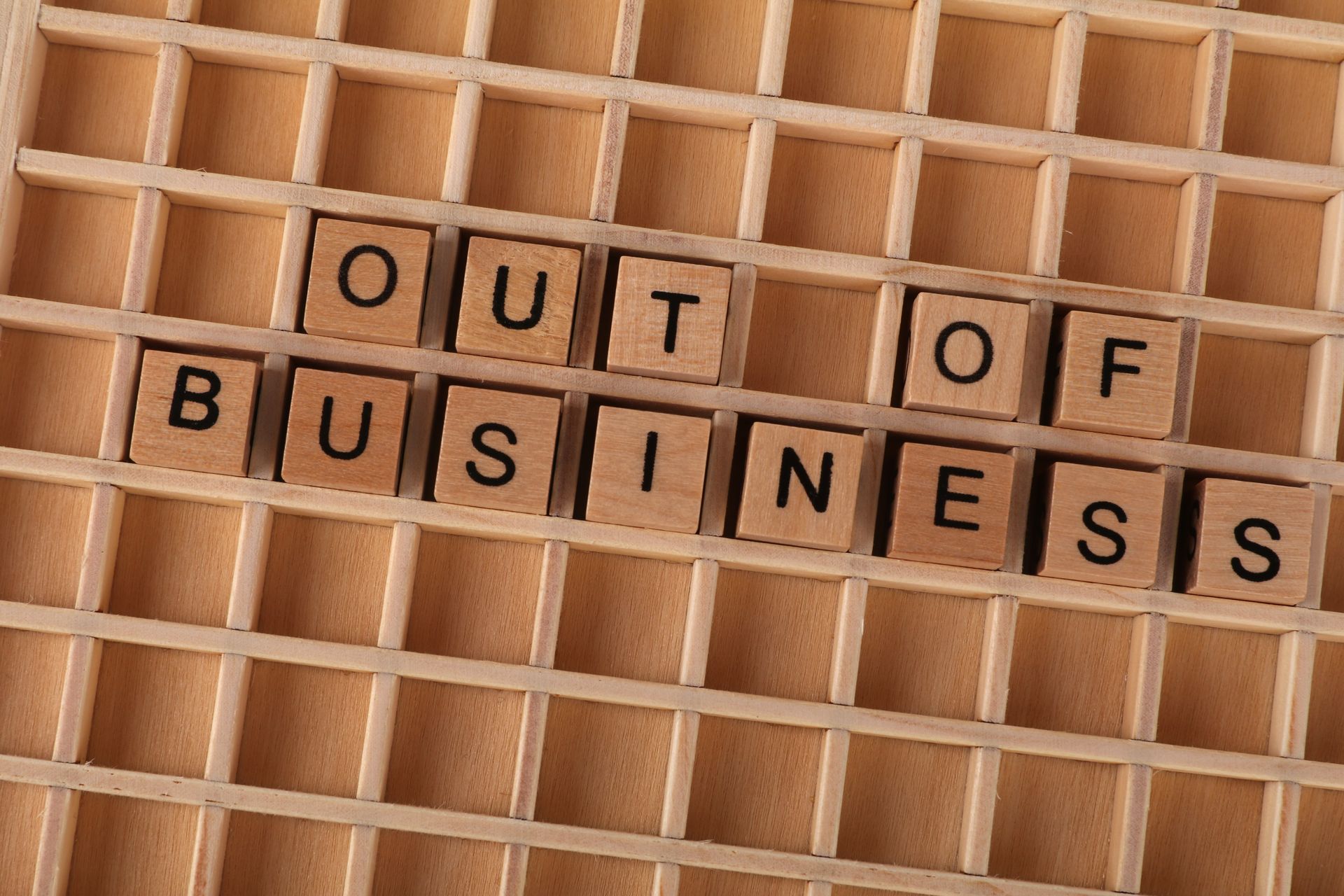 Out of business concept illustrating long-term revenue loss from a slow Shopify store